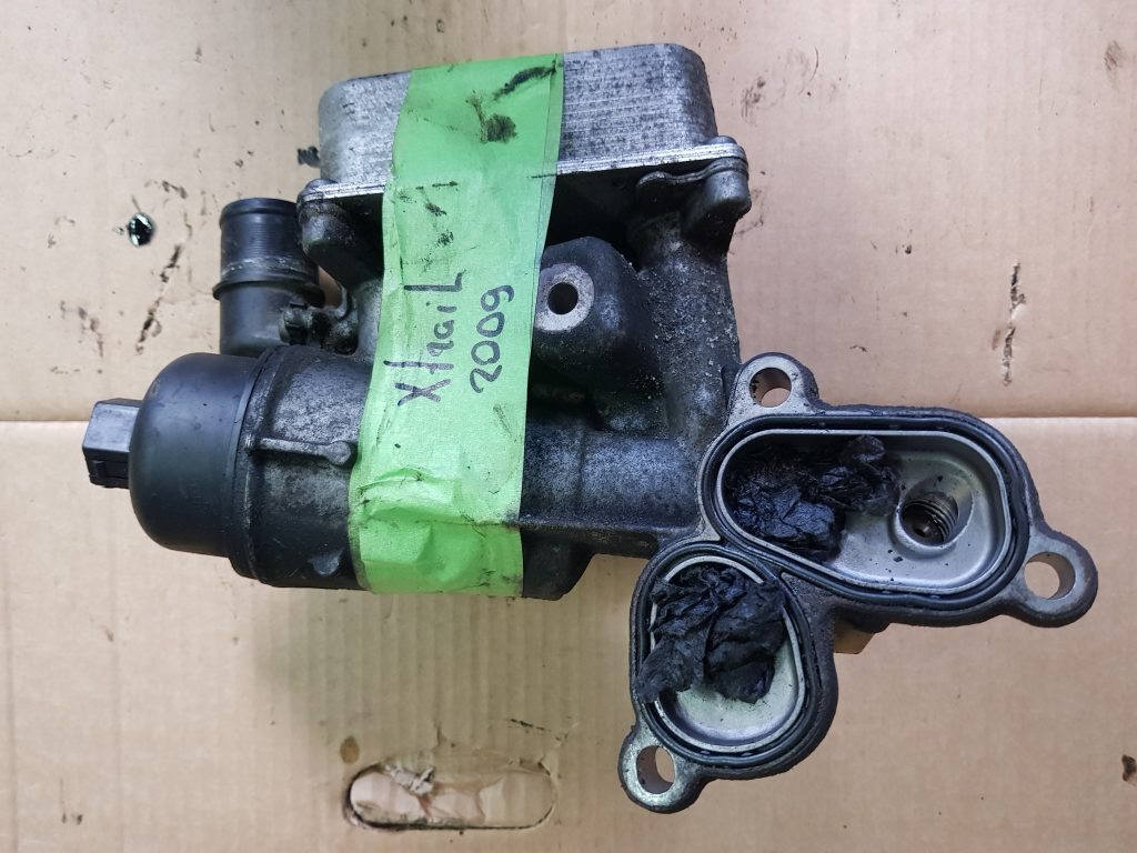 Eļļas filtra korpuss priekš NISSAN X-TRAIL 2008