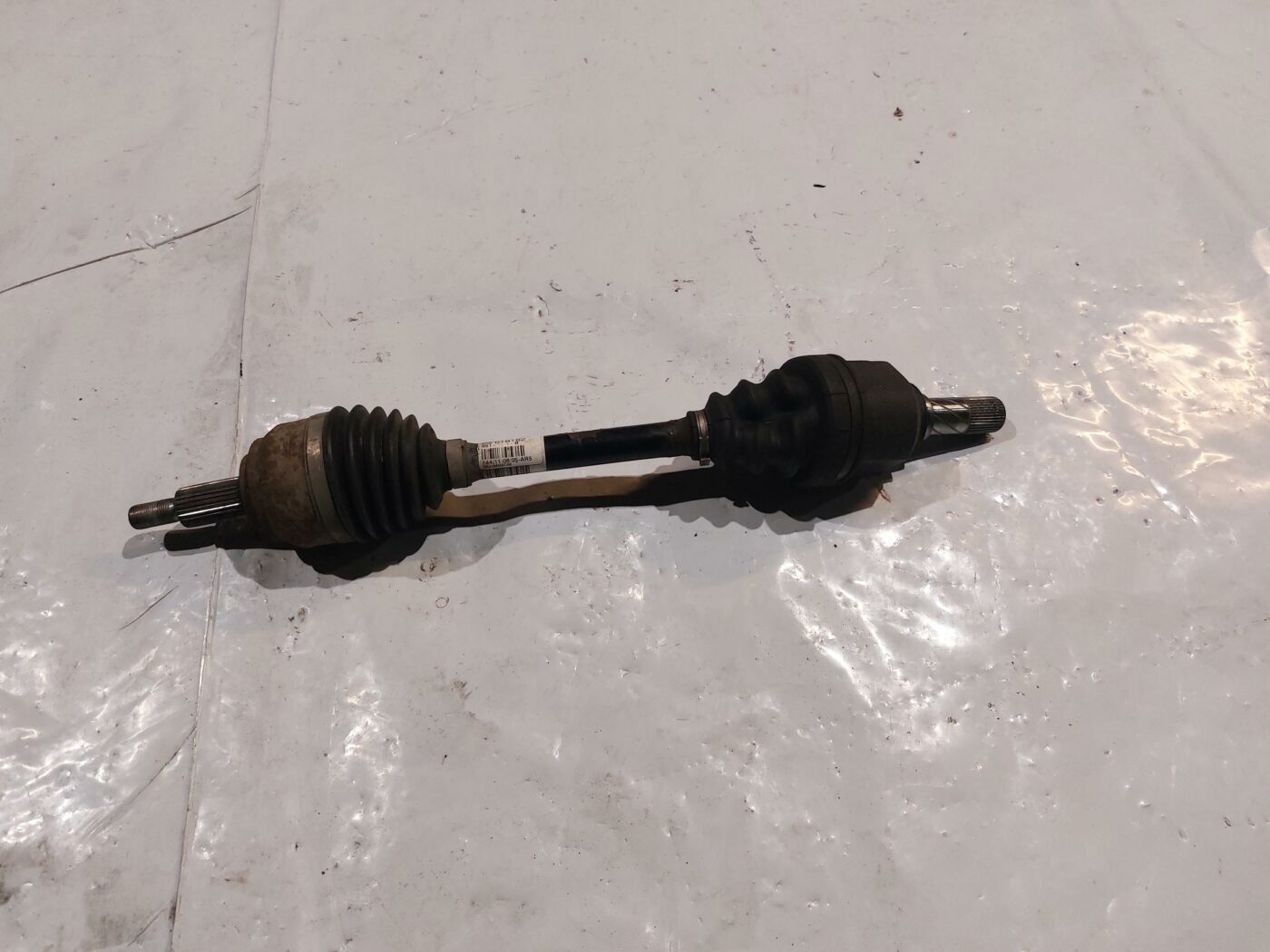 Pusass priekšējā kreisā priekš RENAULT LAGUNA 2011