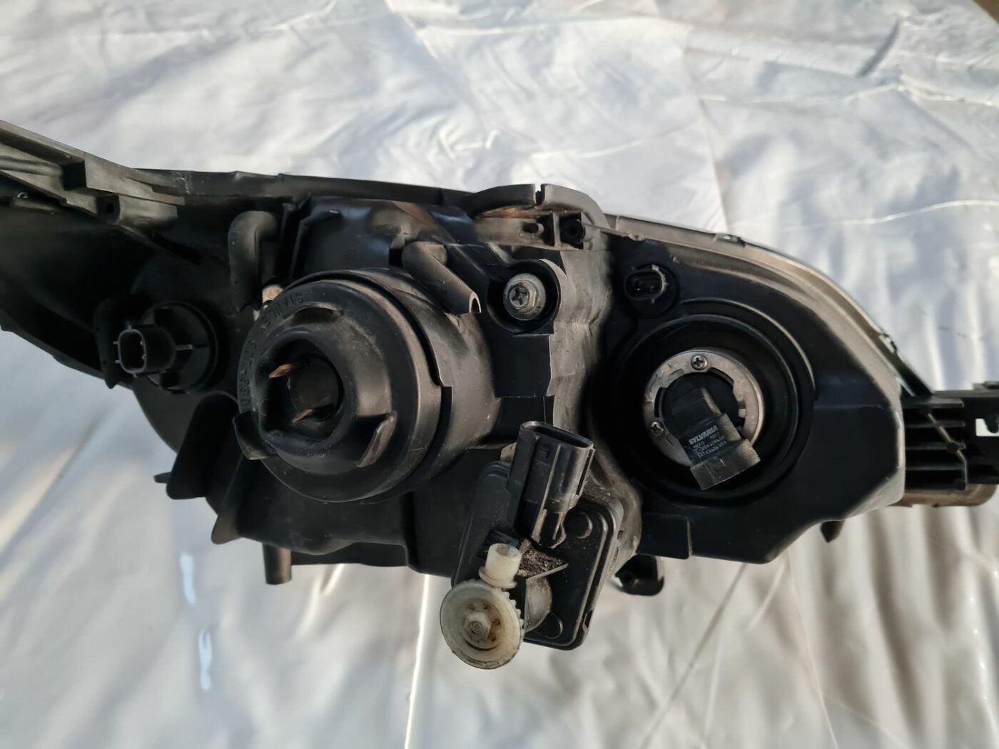 Priekšējais kreisais lukturis priekš MAZDA 3 2007 4 Priekšējais kreisais lukturis priekš MAZDA 3 2007