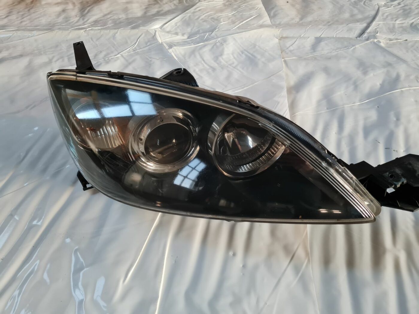 Priekšējais labais lukturis priekš MAZDA 3 2007 2 Priekšējais labais lukturis priekš MAZDA 3 2007