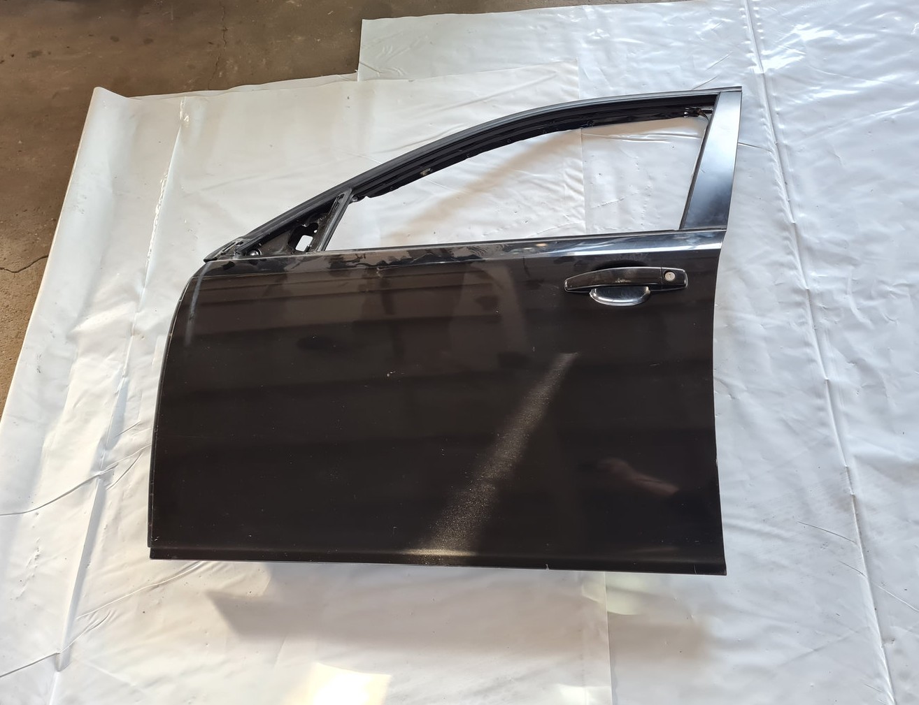 Priekšējās kreisās durvis priekš SAAB 9-3 2009 1 Priekšējās kreisās durvis priekš SAAB 9-3 2009