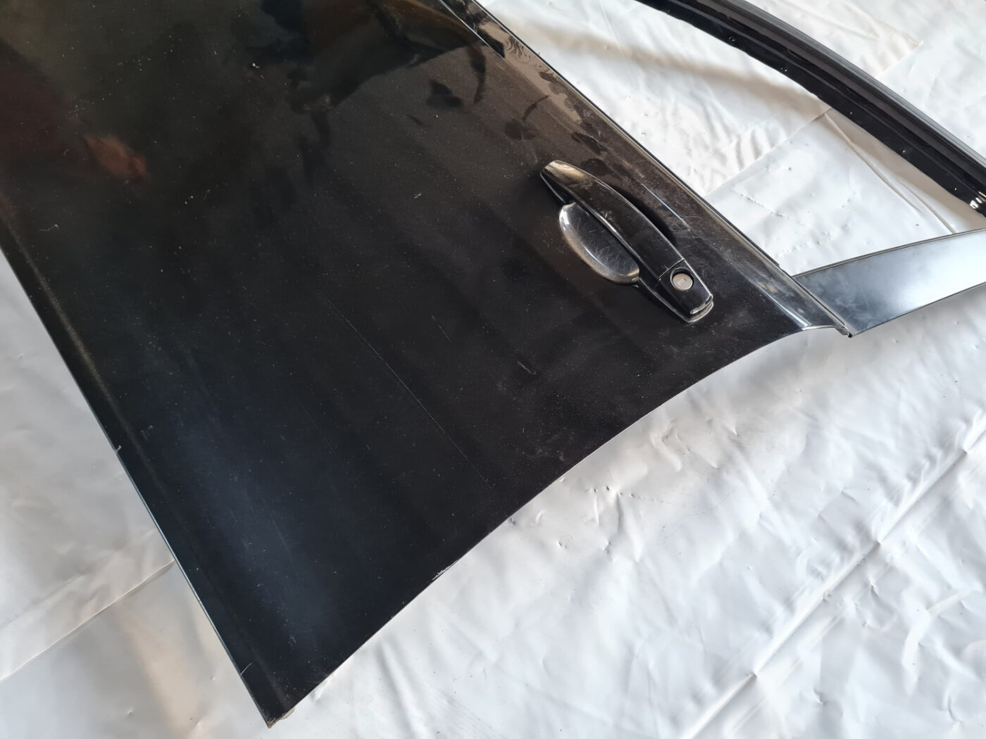 Priekšējās kreisās durvis priekš SAAB 9-3 2009 7 Priekšējās kreisās durvis priekš SAAB 9-3 2009