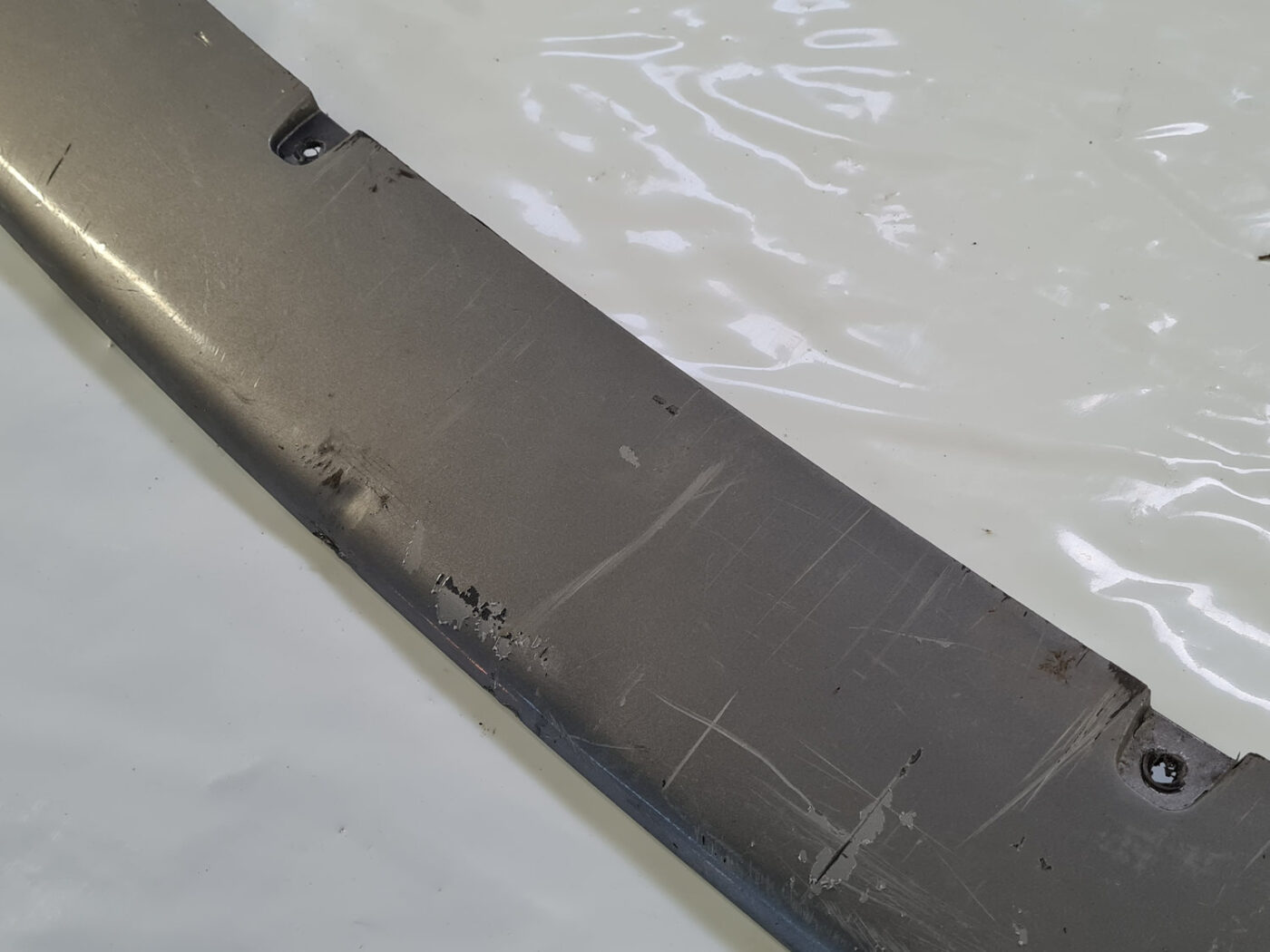 Aizmugurēja bufera spoileris (lūpa) priekš VOLVO S40 2004 Grey 11 Aizmugurēja bufera spoileris (lūpa) priekš VOLVO S40 2004 Grey